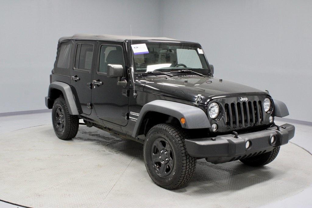 used 2018 Jeep Wrangler JK Unlimited car, priced at $19,306