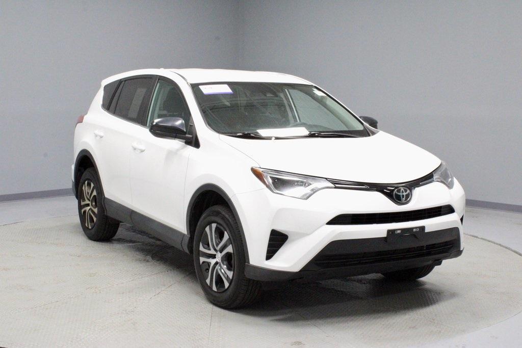 used 2018 Toyota RAV4 car, priced at $19,047