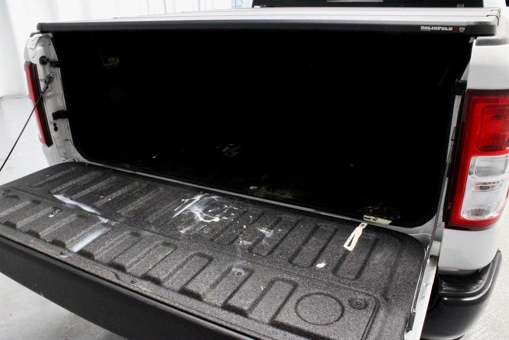 used 2021 Ram 1500 car, priced at $22,756