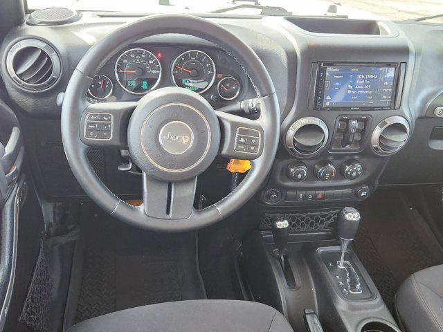 used 2015 Jeep Wrangler Unlimited car, priced at $20,794