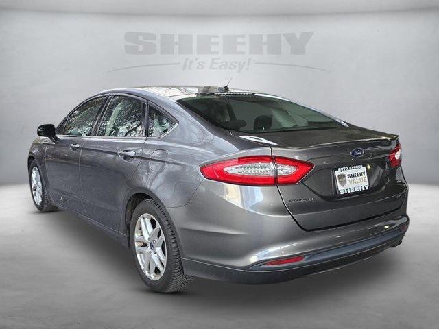 used 2014 Ford Fusion car, priced at $12,000