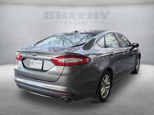 used 2014 Ford Fusion car, priced at $12,000