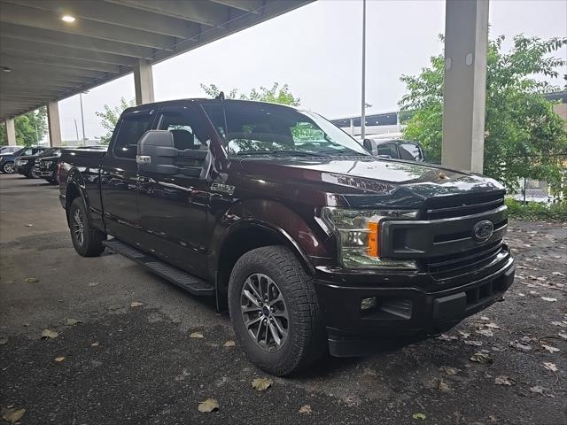 used 2018 Ford F-150 car, priced at $23,500