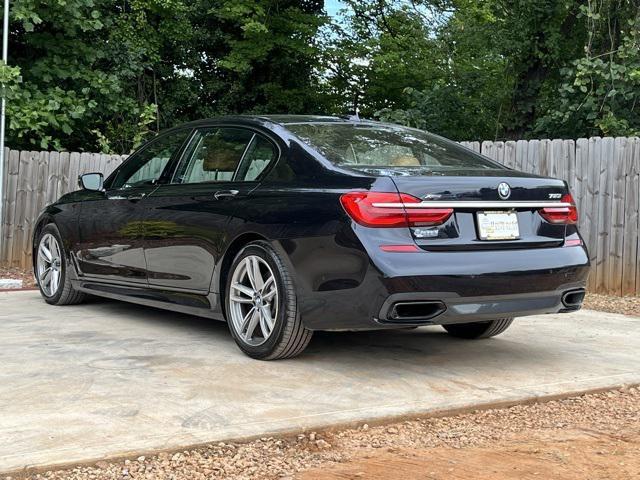 used 2016 BMW 750 car, priced at $18,975