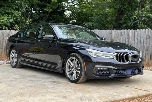 used 2016 BMW 750 car, priced at $18,975