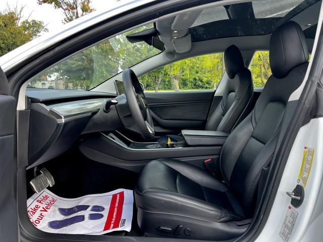used 2018 Tesla Model 3 car, priced at $17,475