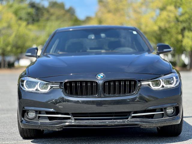 used 2018 BMW 330 car, priced at $14,775