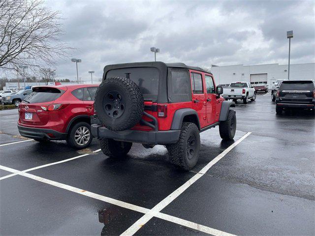 used 2016 Jeep Wrangler Unlimited car, priced at $18,002