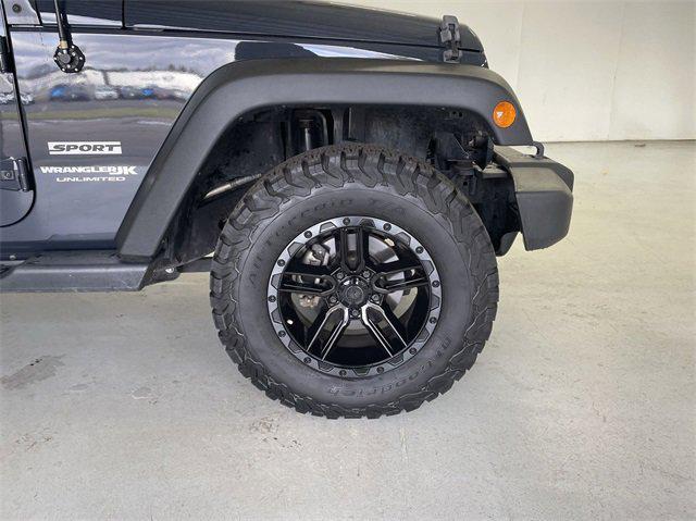 used 2018 Jeep Wrangler JK Unlimited car, priced at $21,476