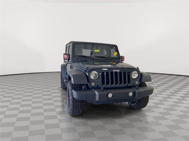 used 2018 Jeep Wrangler JK Unlimited car, priced at $21,476