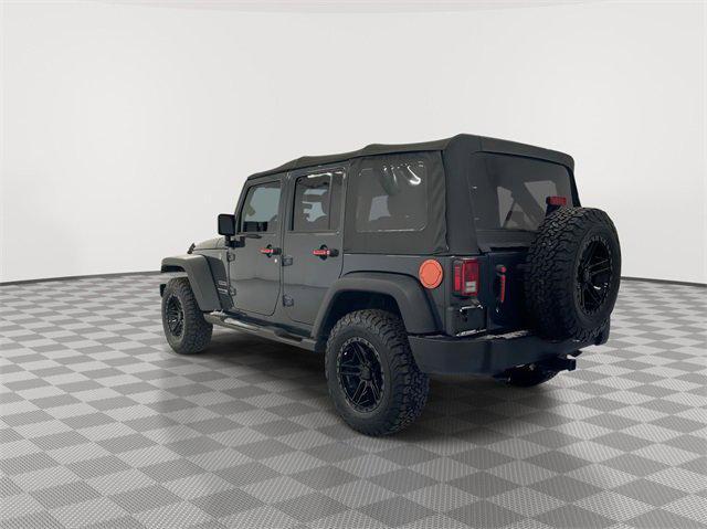 used 2018 Jeep Wrangler JK Unlimited car, priced at $21,476