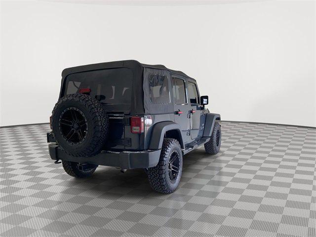 used 2018 Jeep Wrangler JK Unlimited car, priced at $21,476