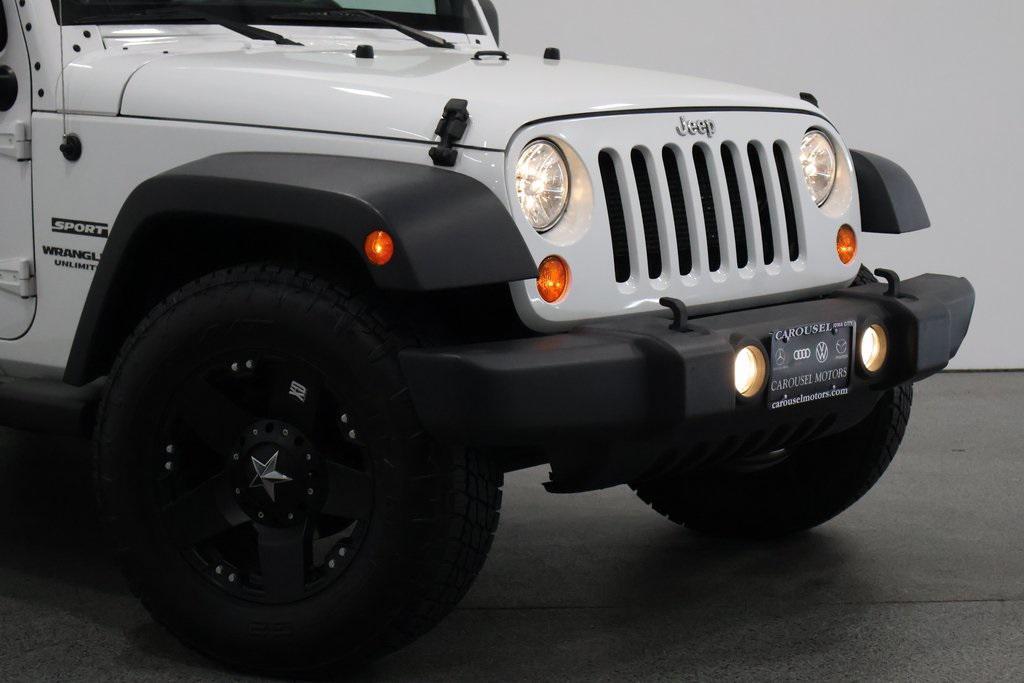used 2013 Jeep Wrangler Unlimited car, priced at $17,930