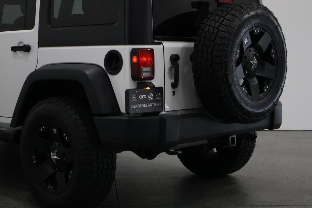 used 2013 Jeep Wrangler Unlimited car, priced at $17,930