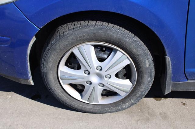 used 2009 Nissan Versa car, priced at $3,250