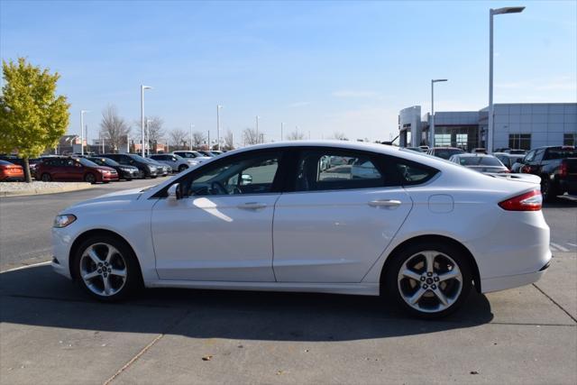 used 2015 Ford Fusion car, priced at $9,999