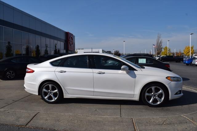 used 2015 Ford Fusion car, priced at $9,999