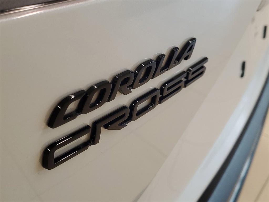 used 2024 Toyota Corolla Cross Hybrid car, priced at $28,852