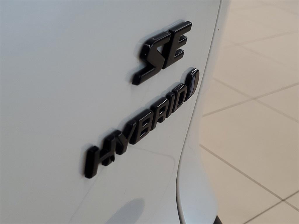 used 2024 Toyota Corolla Cross Hybrid car, priced at $28,852
