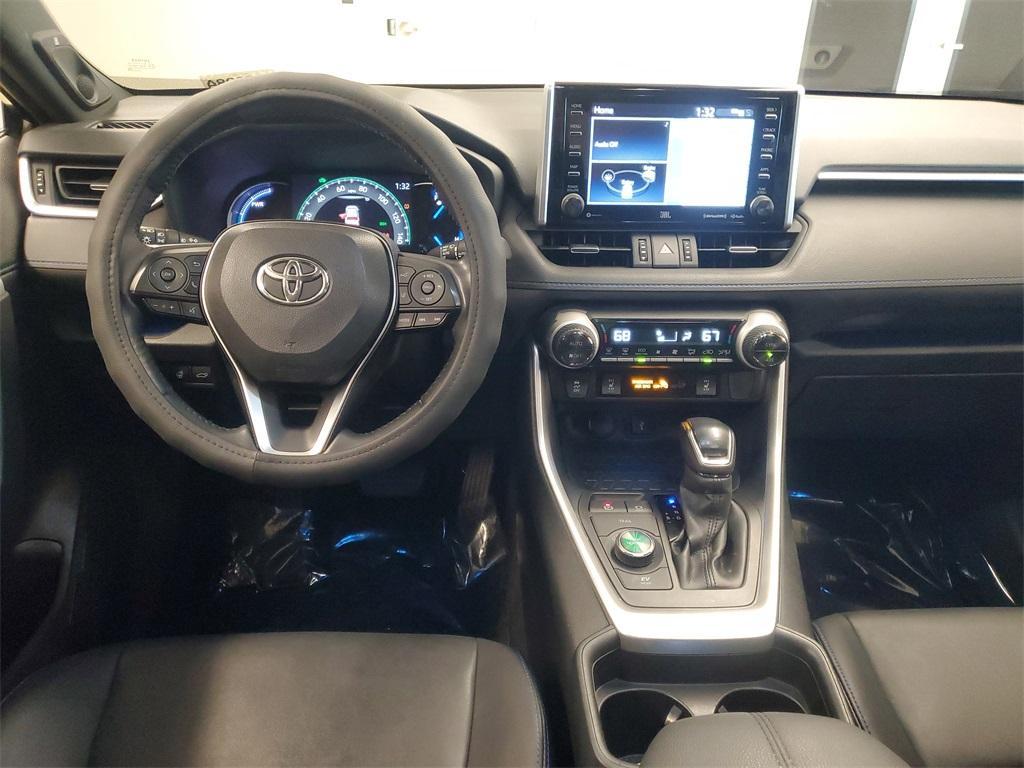 used 2021 Toyota RAV4 Hybrid car, priced at $28,694