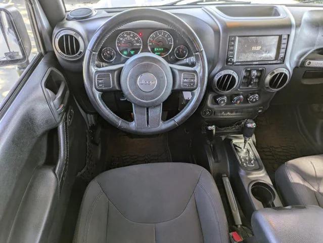 used 2015 Jeep Wrangler Unlimited car, priced at $16,577