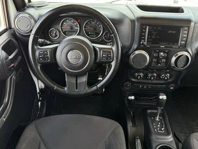 used 2015 Jeep Wrangler Unlimited car, priced at $16,955
