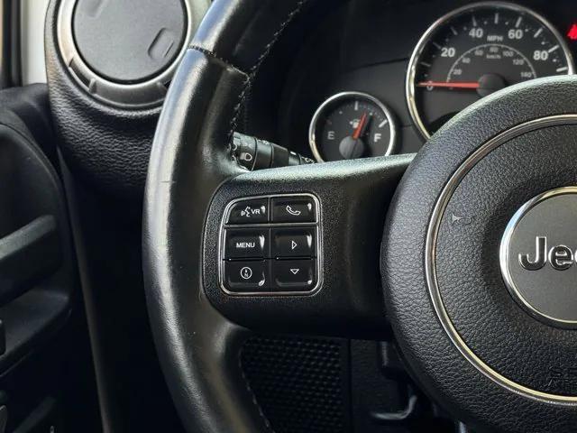 used 2015 Jeep Wrangler Unlimited car, priced at $16,955