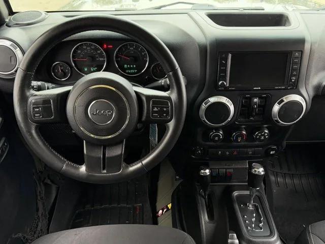 used 2015 Jeep Wrangler Unlimited car, priced at $16,950