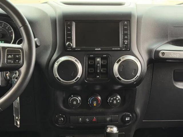 used 2015 Jeep Wrangler Unlimited car, priced at $16,950