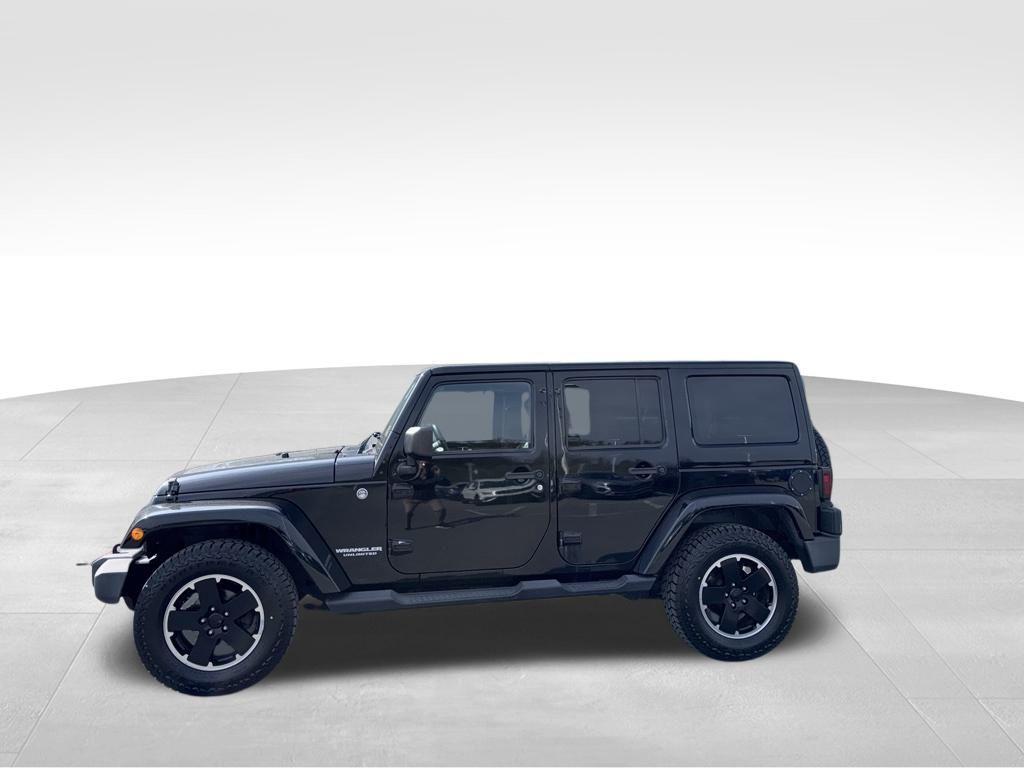 used 2012 Jeep Wrangler Unlimited car, priced at $15,699