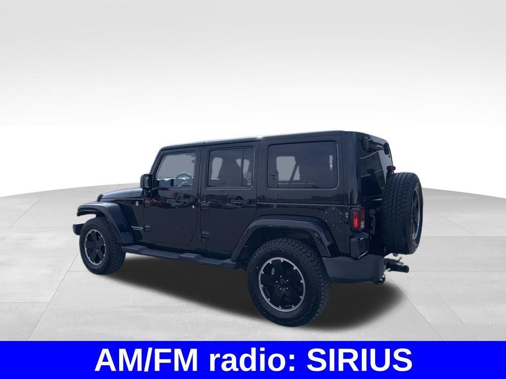 used 2012 Jeep Wrangler Unlimited car, priced at $15,699
