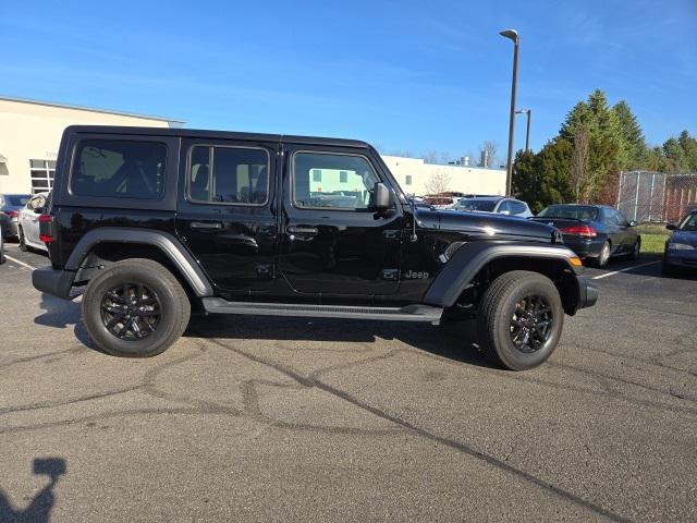 used 2023 Jeep Wrangler car, priced at $33,658