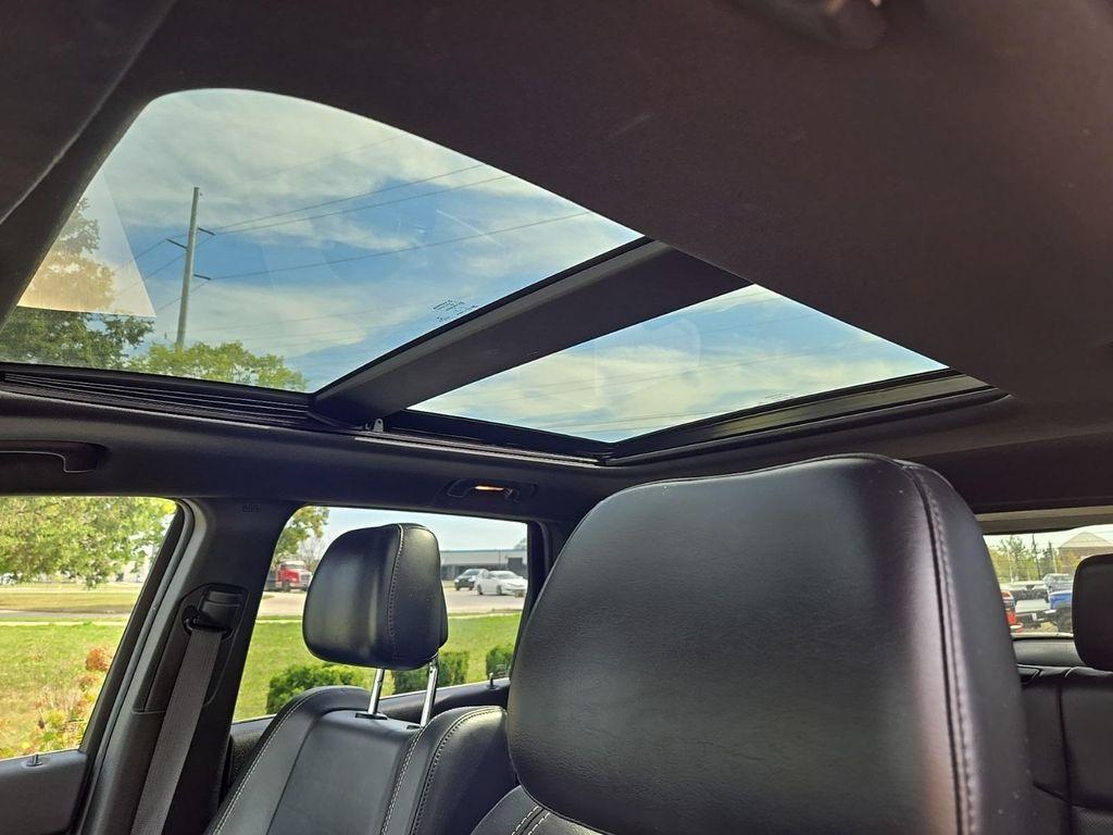 used 2014 Jeep Grand Cherokee car, priced at $14,355