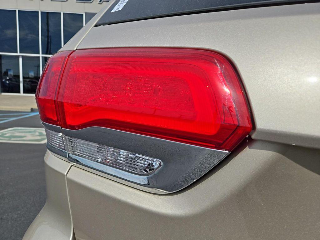 used 2014 Jeep Grand Cherokee car, priced at $14,355
