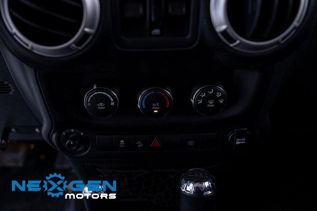 used 2018 Jeep Wrangler JK Unlimited car, priced at $16,500