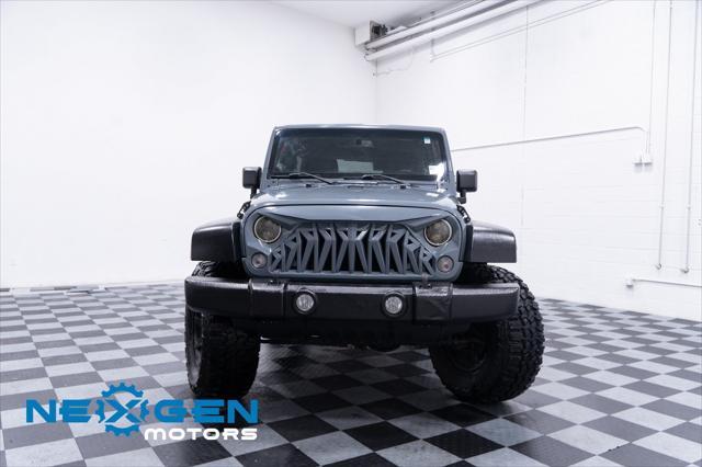 used 2014 Jeep Wrangler Unlimited car, priced at $15,500