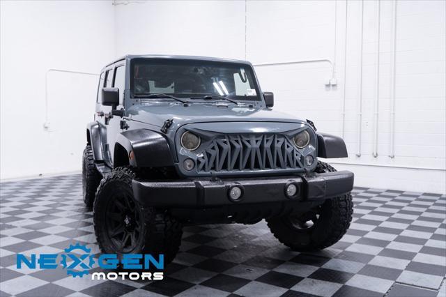 used 2014 Jeep Wrangler Unlimited car, priced at $15,500