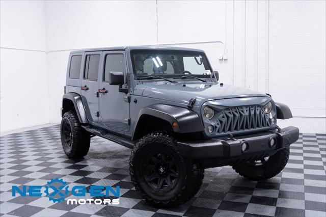 used 2014 Jeep Wrangler Unlimited car, priced at $15,800