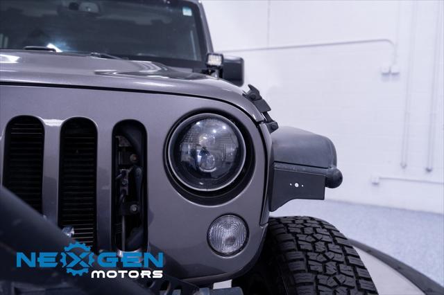 used 2016 Jeep Wrangler Unlimited car, priced at $19,250