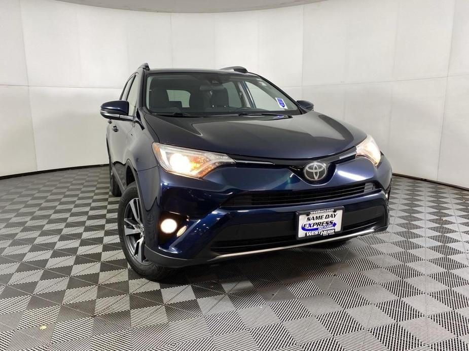 used 2018 Toyota RAV4 car, priced at $19,484