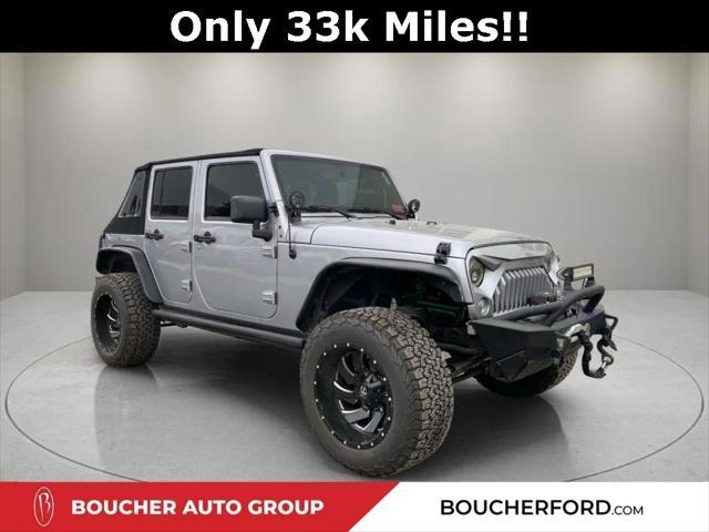 used 2018 Jeep Wrangler JK Unlimited car, priced at $29,122