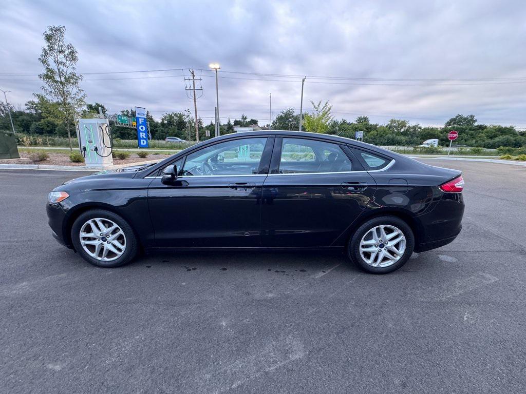 used 2014 Ford Fusion car, priced at $11,997