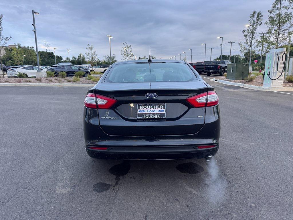 used 2014 Ford Fusion car, priced at $11,997