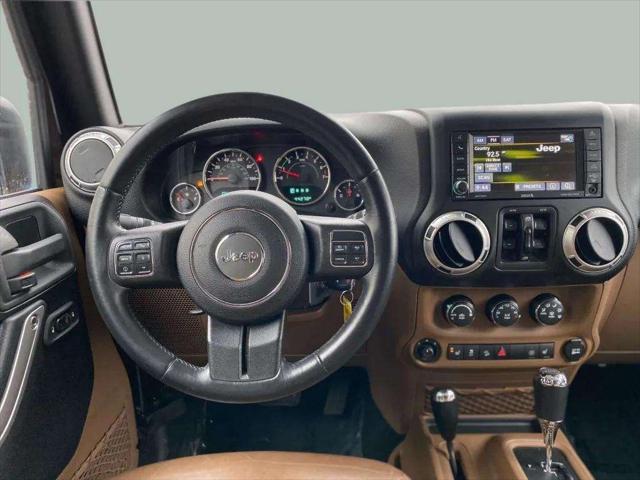 used 2015 Jeep Wrangler Unlimited car, priced at $26,995