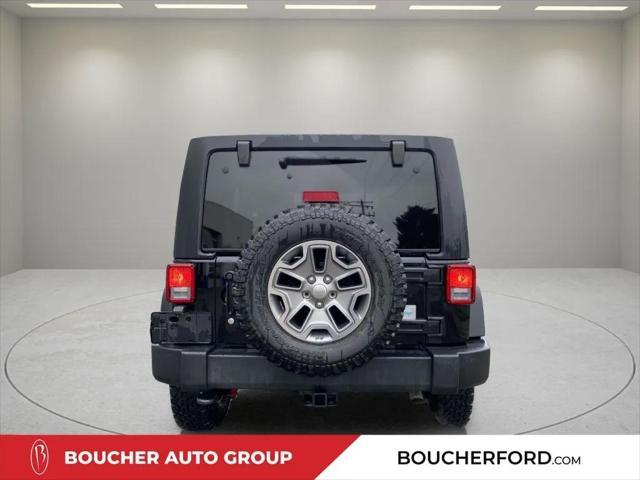 used 2015 Jeep Wrangler Unlimited car, priced at $26,995