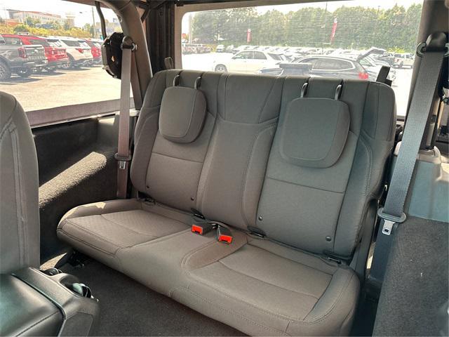 used 2023 Jeep Wrangler car, priced at $28,988
