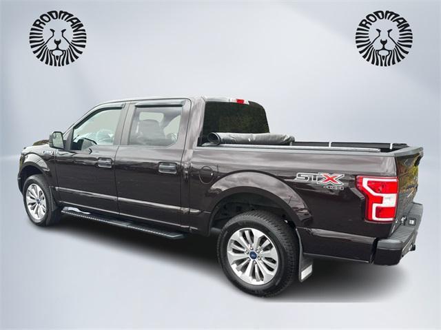 used 2018 Ford F-150 car, priced at $25,521