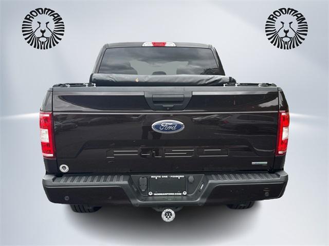 used 2018 Ford F-150 car, priced at $25,521