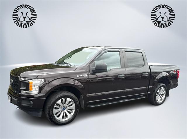used 2018 Ford F-150 car, priced at $25,521