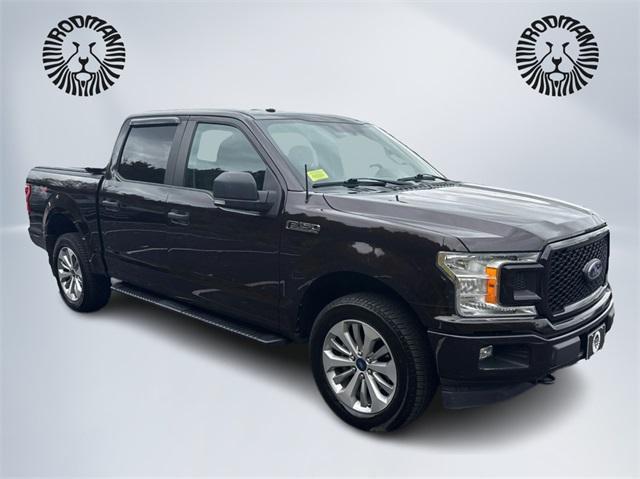 used 2018 Ford F-150 car, priced at $25,521